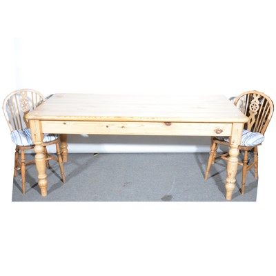 Lot 510 - A pine kitchen table, and six beechwood wheel-back kitchen chairs