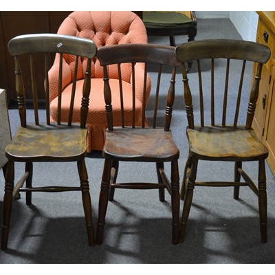 Lot 504 - A harlequin set of eight elm and beech kitchen chairs.