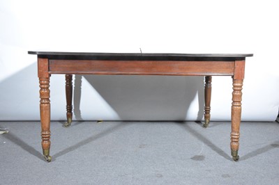 Lot 511 - A mahogany extending dining table