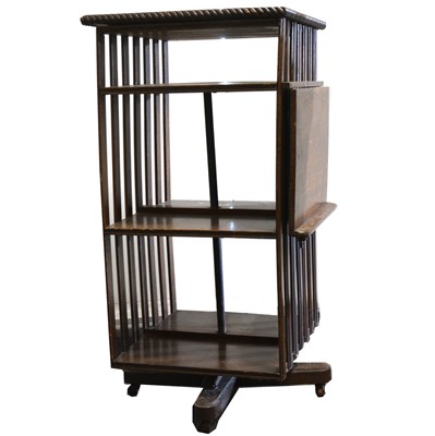 Lot 53 - A stained oak revolving bookcase, early 20th Century