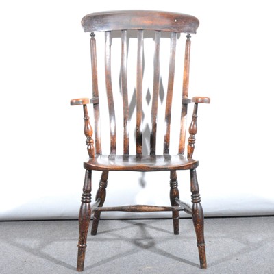 Lot 515 - A Victorian beech farmhouse elbow chair