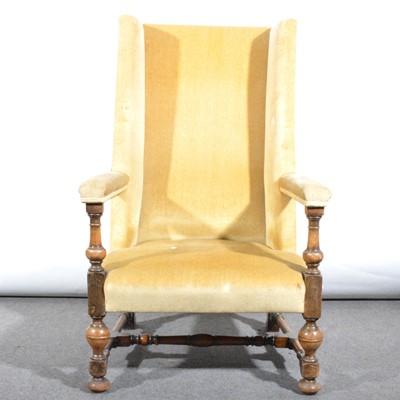 Lot 491 - A wing-back easy chair, in the 17th Century style