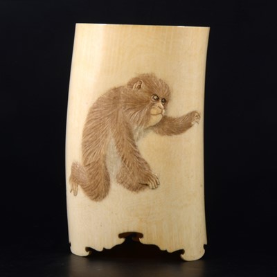 Lot 34 - A Japanese carved ivory brush holder, Meiji