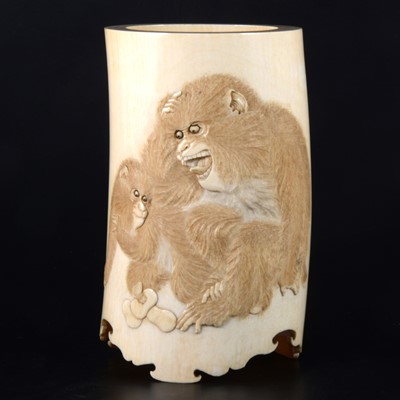 Lot 34 - A Japanese carved ivory brush holder, Meiji