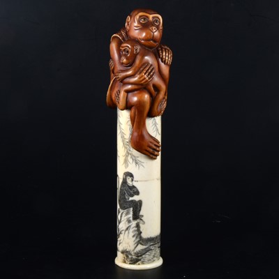 Lot 36 - A Japanese carved bone and stained wood scroll case, early 20th Century