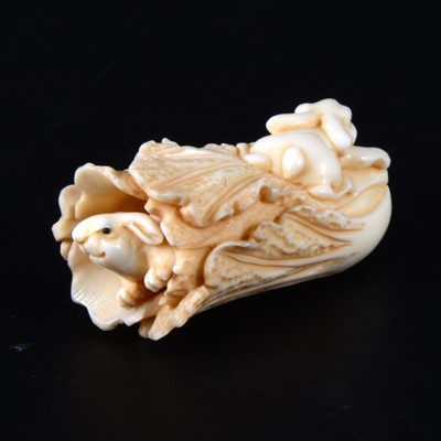 Lot 37 - A small Japanese carved ivory okimono, early 20th Century