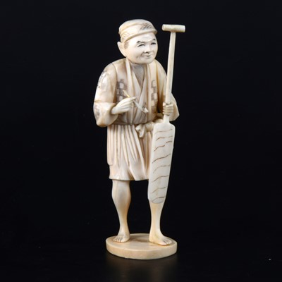 Lot 39 - A Japanese carved and sectional ivory okimono, early 20th Century