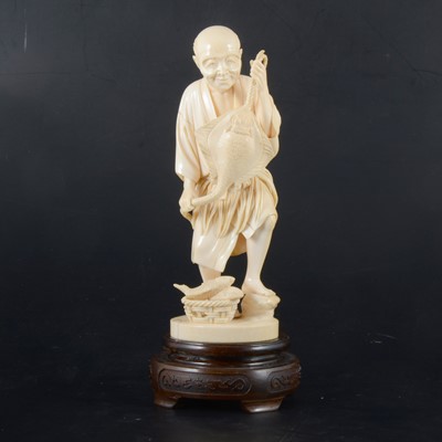 Lot 40 - A Japanese carved ivory okimono, Meiji