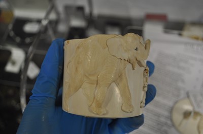 Lot 47 - A Japanese carved and stained ivory box, early 20th Century