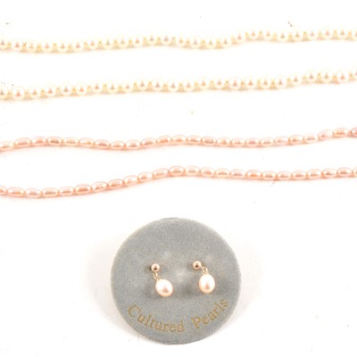 Lot 319 - A cultured pearl necklace and another pearl necklace with matching earrings.