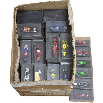 Lot 202 - Champion Racing Bikes by DeAgostini; approximately 60 x 1:24 scale models, all cased with magazines.