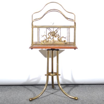 Lot 437 - Edwardian style brass Canterbury, and two brass companion sets