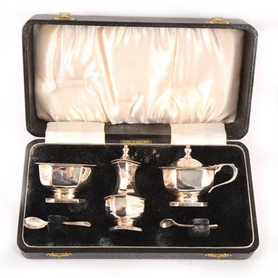 Lot 159 - A cased three piece silver condiment set.
