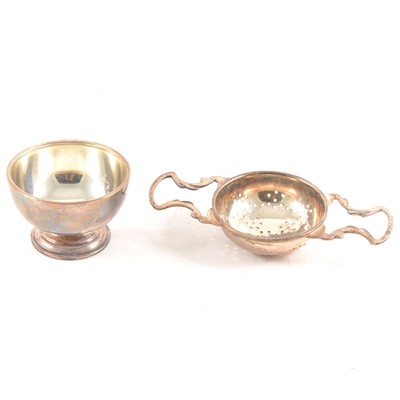Lot 181 - A silver tea strainer and stand by Asprey & Co.