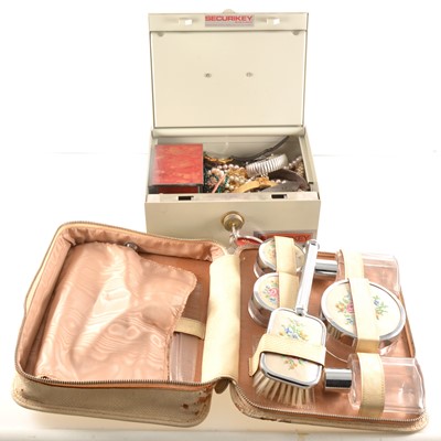 Lot 327 - A collection of costume jewellery and lady's cased toilet set.
