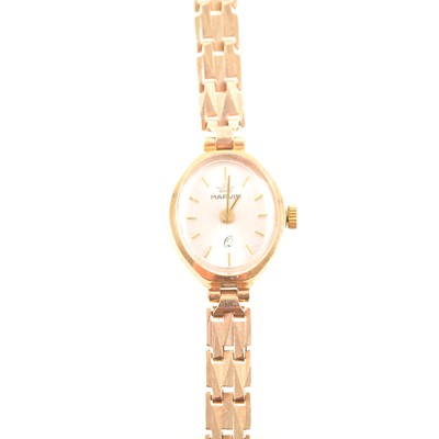Lot 292 - Marvin - a lady's 9 carat yellow gold bracelet watch.