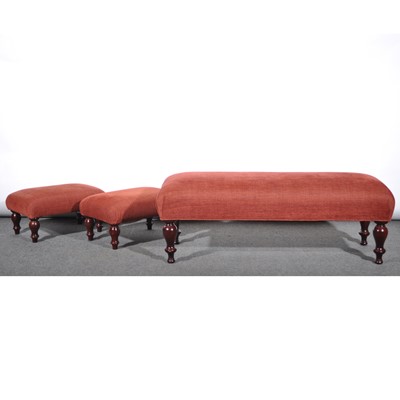 Lot 496 - A contemporary upholstered longstool and two matching footstools