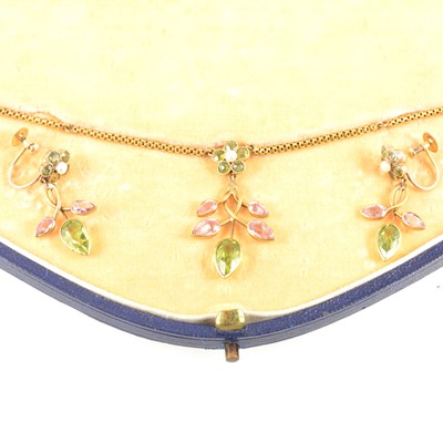 Lot 214 - A suite of necklace and earrings set with peridot and tourmaline.