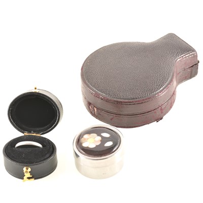 Lot 303 - A white metal wedding band marked platinum, in box, pocket watch box and small mosaic pill box.
