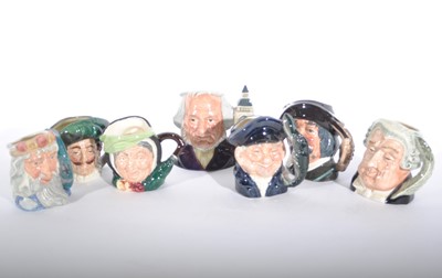 Lot 59 - Fourteen Royal Doulton character jugs
