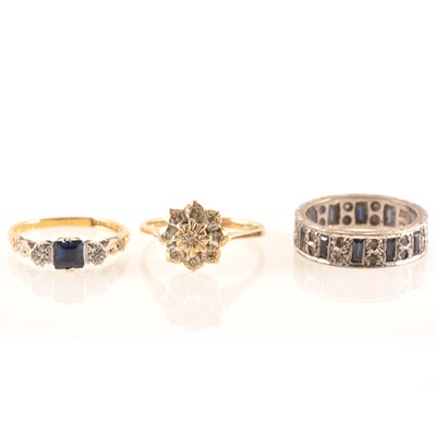 Lot 228 - Three gemset rings.