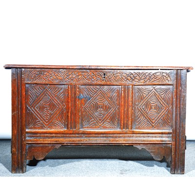 Lot 516 - An oak three panel coffer