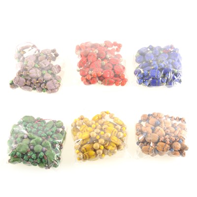 Lot 318 - Six  Egyptian Revival pressed glass scarab bead necklaces.
