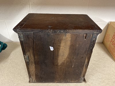Lot 446 - George III oak spice cabinet
