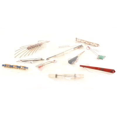 Lot 315 - Ten Art Deco costume jewellery bar brooches, decorated with enamels and paste.