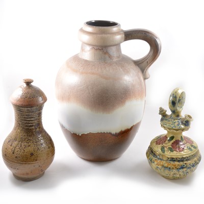 Lot 43 - A large floor standing stoneware jug, probably German, 50cm, two other urns.