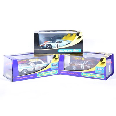 Lot 215 - Three Scalextric slot-car racing models.