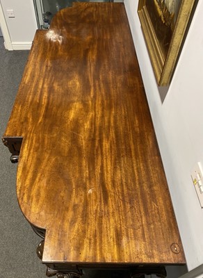 Lot 438 - A George III mahogany breakfront serving table, in the manner of Thomas Hope, circa 1810