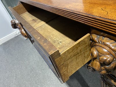 Lot 438 - A George III mahogany breakfront serving table, in the manner of Thomas Hope, circa 1810