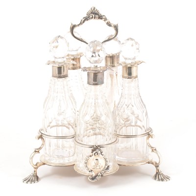 Lot 99 - A George II style silver five bottle cruet