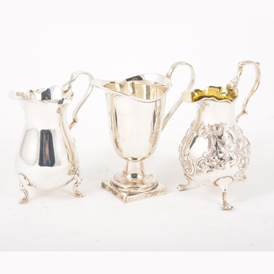 Lot 136 - George II style silver pear-shape cream jug