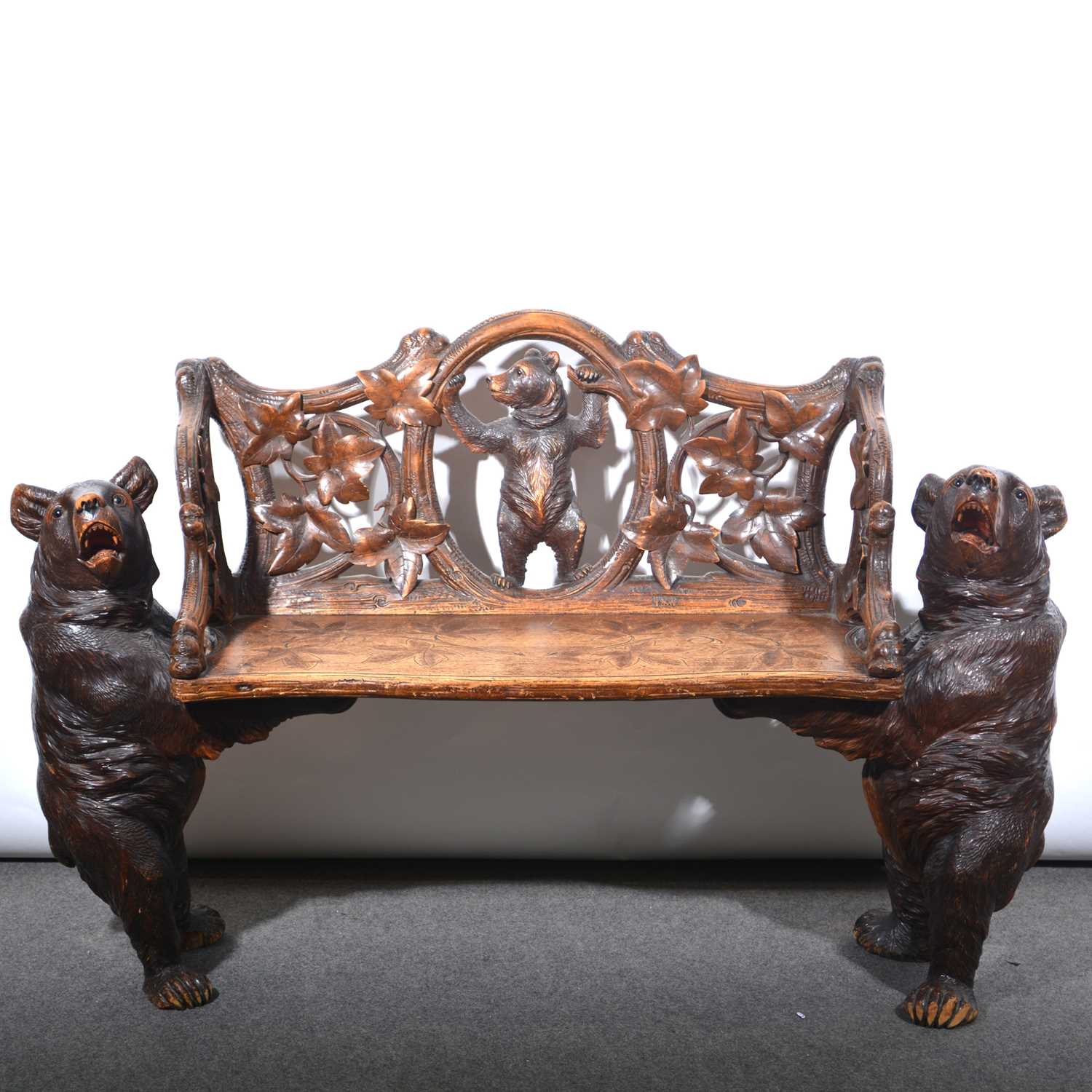Lot 424 - Black Forest carved spruce/pine bench