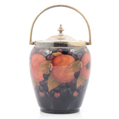 Lot 151 - William Moorcroft, a 'Pomegranate' pattern biscuit barrel.