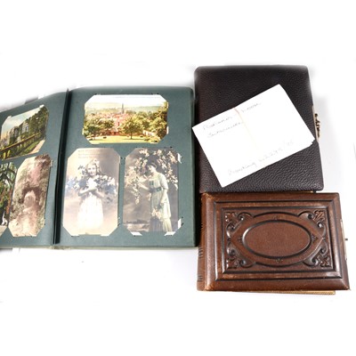 Lot 194 - Postcard and photograph albums.