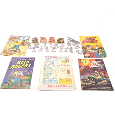 Lot 24 - Buck Roger comics and cast figures.