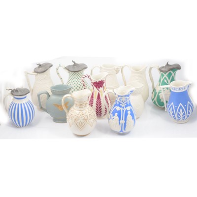 Lot 66 - Stoneware Ivy jug and eleven other jugs