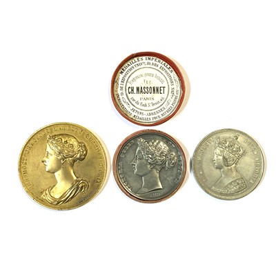 Lot 130 - Victoria Queen of England Universal Exhibition of London 1862, white metal medal and three others