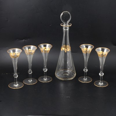Lot 30 - Continental glass decanter and five flutes.