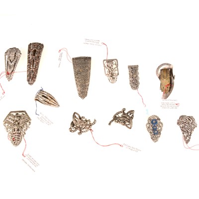 Lot 351 - Twelve maracsite 1930's/1940's single dress clips.