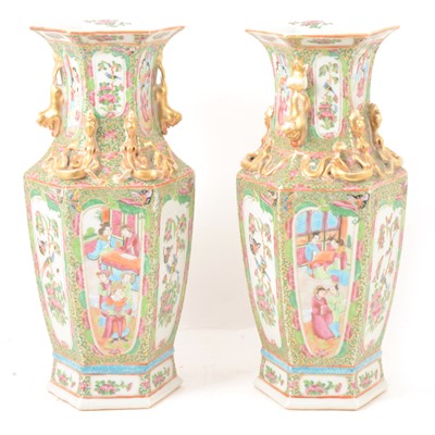 Lot 112 - Pair of Cantonese famille rose hexagonal vases.