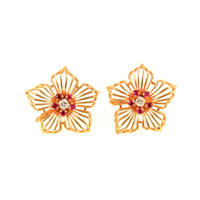 Lot 84 - A pair of ruby and diamond earrings.