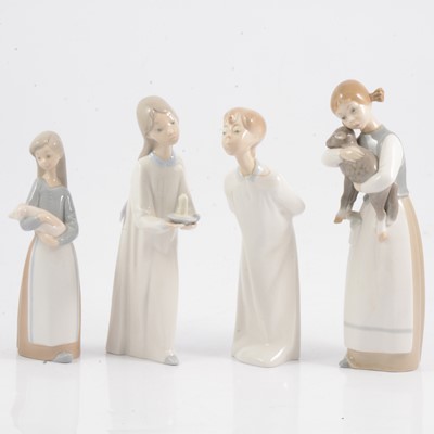Lot 36 - Four Lladro figures.