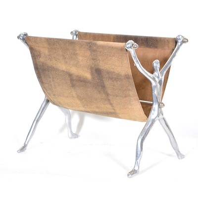 Lot 398 - Aluminium and leather magazine rack by Carrol Boyes.