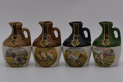 Lot 127 - Twenty four assorted Rutherford's ceramic decanters
