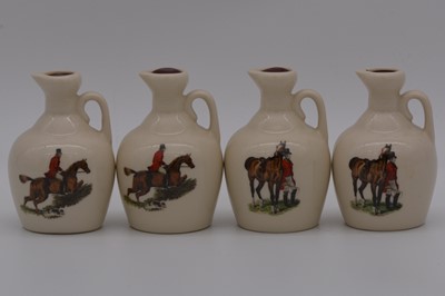 Lot 126 - Twenty two assorted Rutherford's white ceramic decanters, animals and hunting