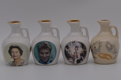 Lot 128 - Twenty four assorted Rutherford's ceramic decanters, Royal Commemoratives
